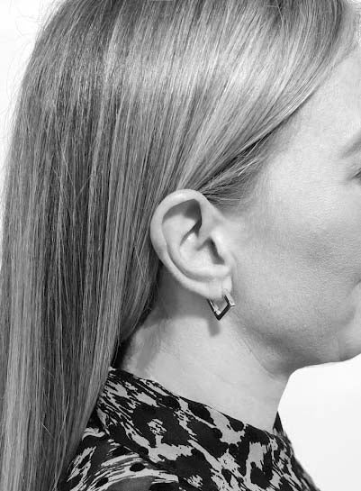 Model wearing Gold Not Yer Average Square Hoop Earrings