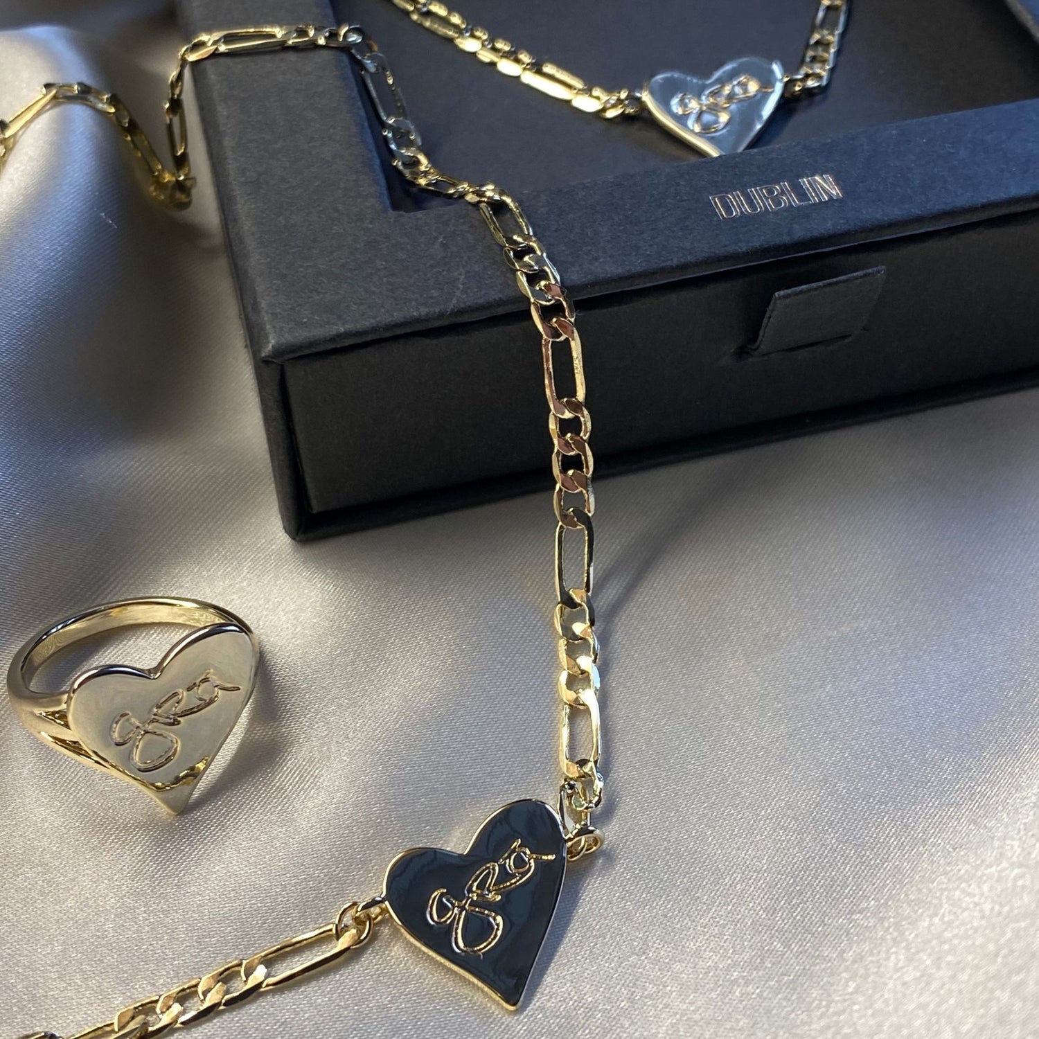 Gold Grá Mór Heart Shaped Necklace with Matching Ring and Gift Box.  Handwritten Grá on necklace and ring means love in Irish