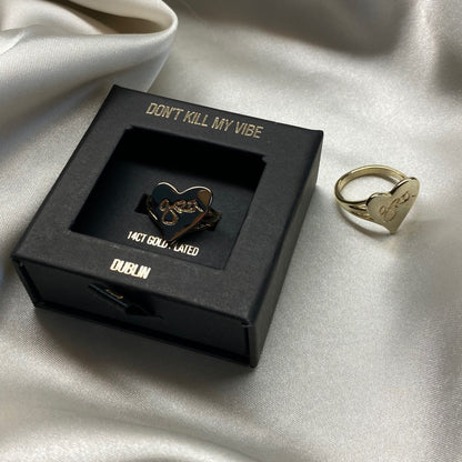 2 Gold Grá Mór Rings on display with one in a Gift Box